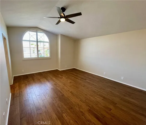 The front secondary bedroom is huge and includes a walk-in closet plus NEW ceiling fan!