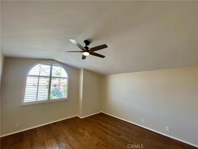 The front secondary bedroom is huge and includes a walk-in closet plus NEW ceiling fan!