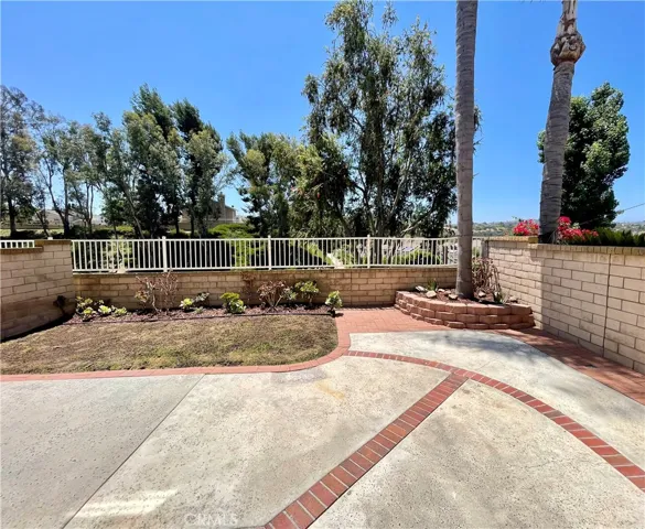 The back yard grassy area has just been reseeded and should be growing green shortly. The rest of the back yard is very low maintenance.