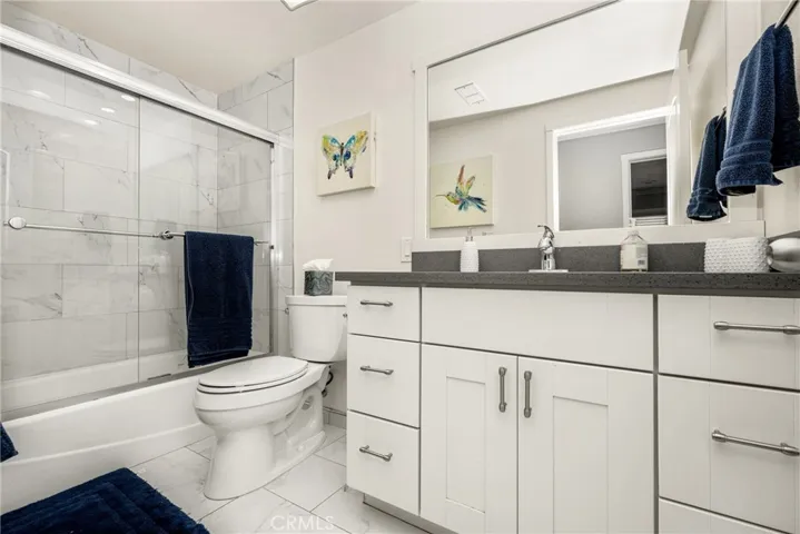 2nd Bath with Double Sinks, Tub and Shower, Tile floors,