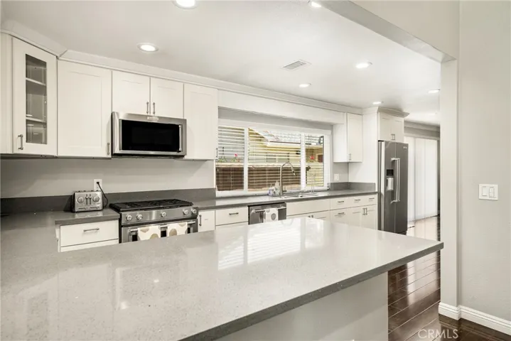 Refrigerator included in Beautiful Contemporary Kitchen