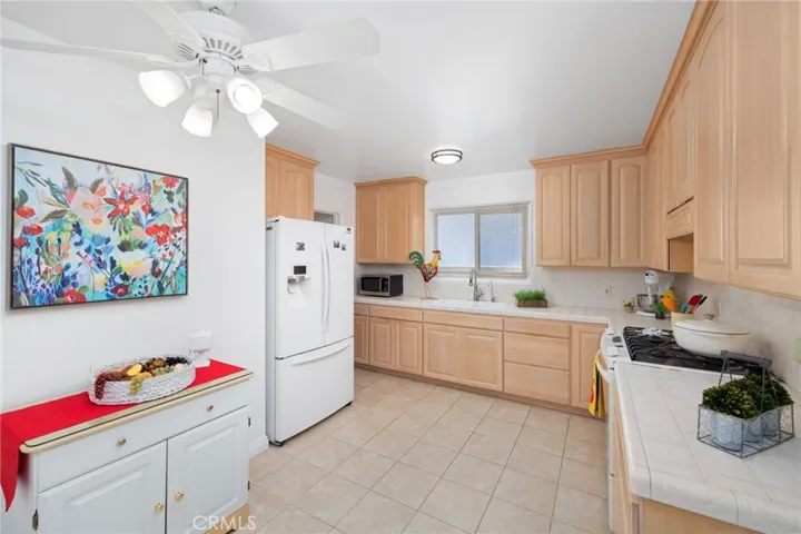 This is a very large kitchen with room for a table.