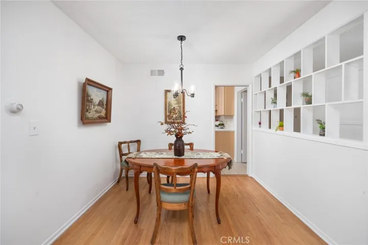 Dining room has a pocket door to pass through to the kitchen.