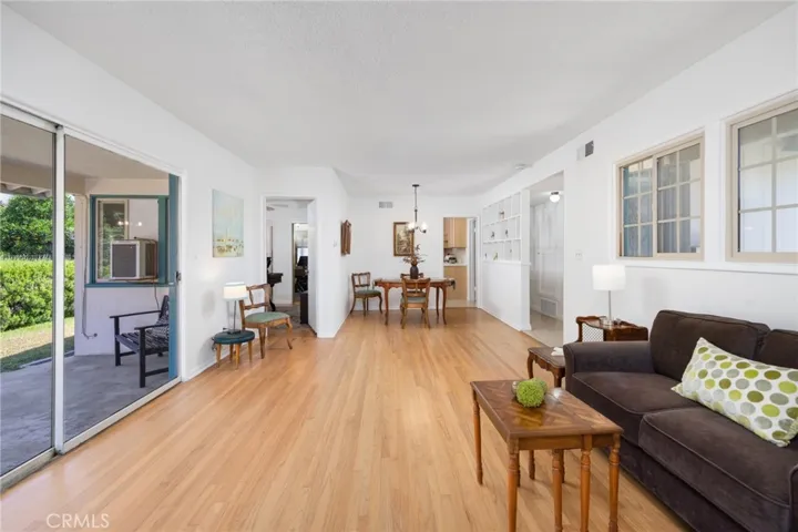 Here's another angle, showing the living room, dining and door to the kitchen.