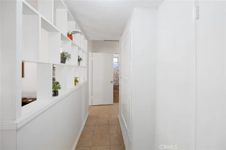 This is the view from the front door as you enter.  LOVE these built in shelves/dividers.  So much character.