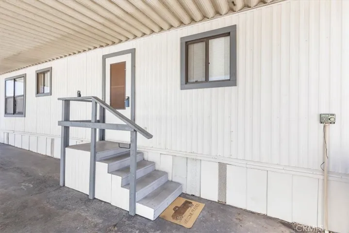 Entrance from Carport side.
