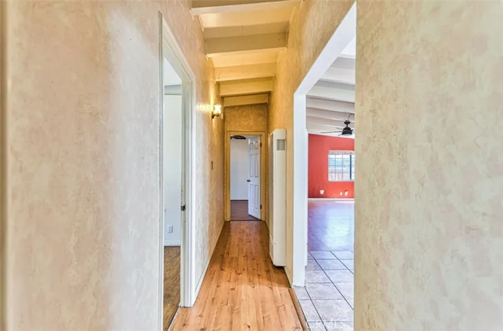 Hallway looking in to Primary bedroom