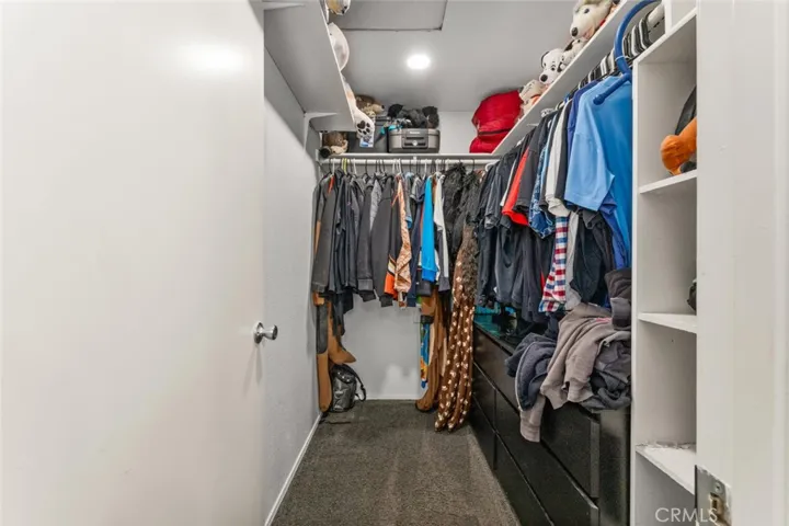Huge walk in closet in primary bedroom