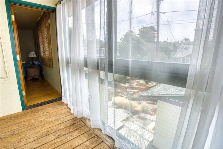 transition doorway to secondary bedroom.