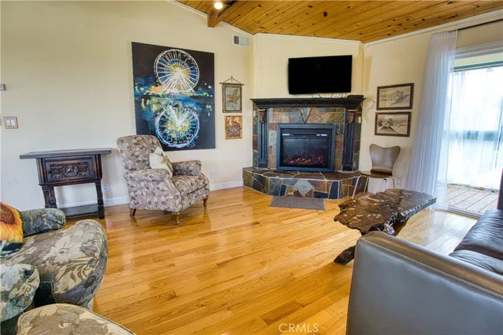 Electric fireplace with ambient lighting for forced air heat.