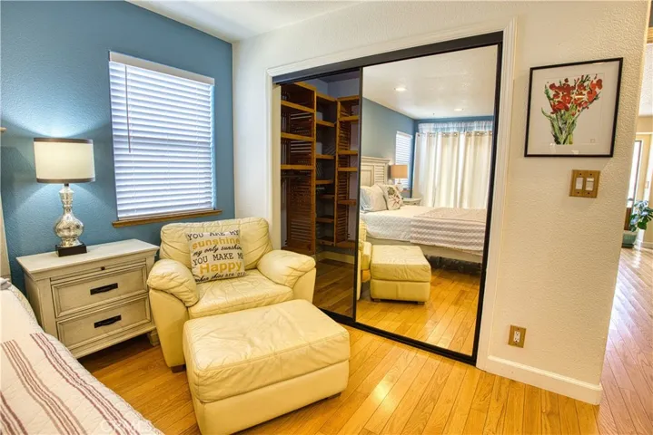Cozy seating for added privacy in master suite.
