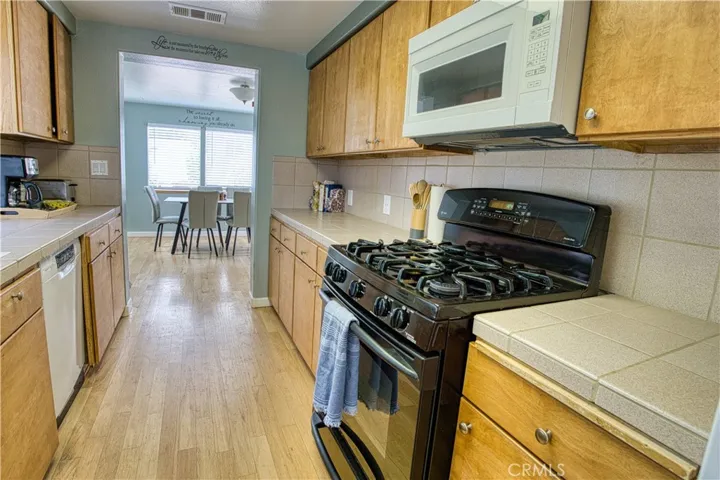 Galley kitchen to dining area.