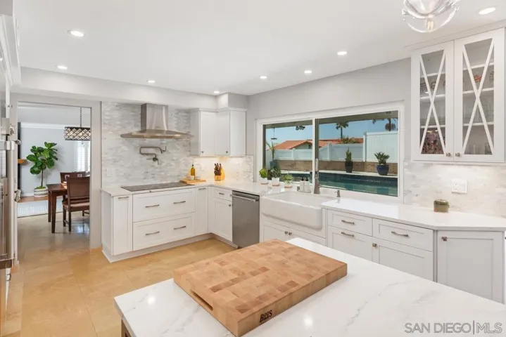 Look out your kitchen window while doing dishes at the enticing pool.