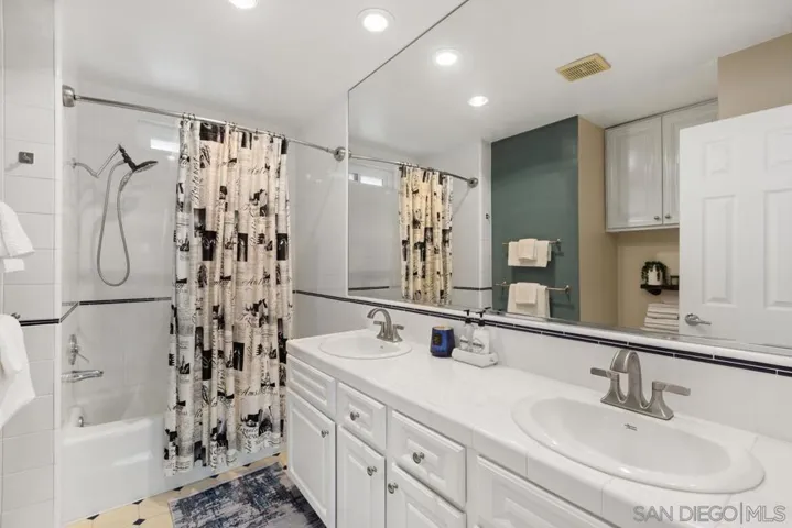 Upstairs bathroom with double sinks