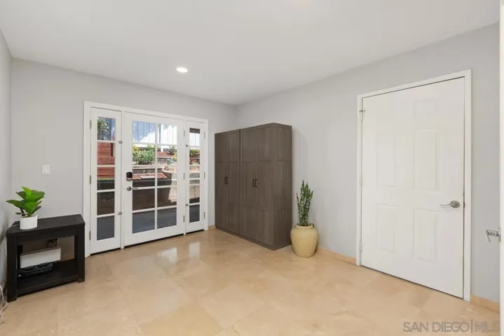 Additional room located on the first level, perfect for an office or could easily be converted into a bedroom. This home could provide seven bedrooms if desired.