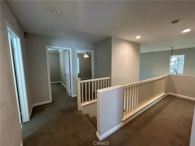 Upstairs. Main bath to left.