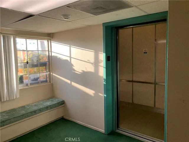 Elevator landing at unit #113's floor
