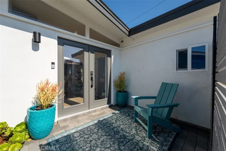 Outside the home facing the entrance
