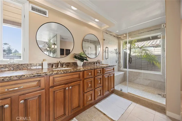 Dual vanities lets you get ready together, while staying out of each others way.