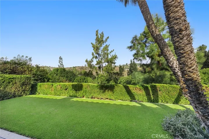 This Mediterranean-inspired sanctuary is very private and quiet, with no neighbors behind it. Instead, enjoy the wide views of Coyote Hills.