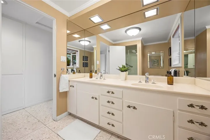 The secondary hall bath is a thoughtfully designed space that balances practicality and style, ideal for family use or guests.