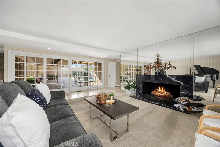 Views  of the outdoors are part of the allure of this home.  It has that breezy, sun drenched ease that makes your time at home feel like a vacation.