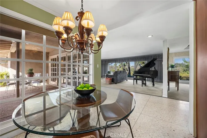 Because the kitchen is the heart of the home, it is centrally located between the formal dining area and living room.