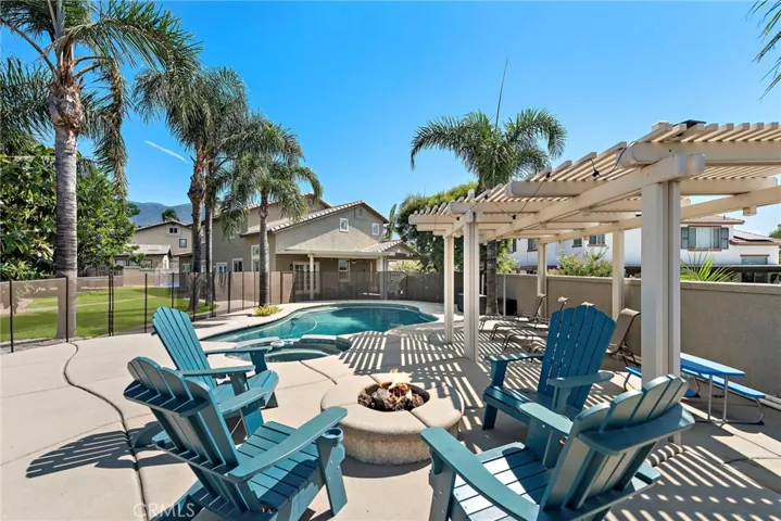 Gated Pool area with fire pit