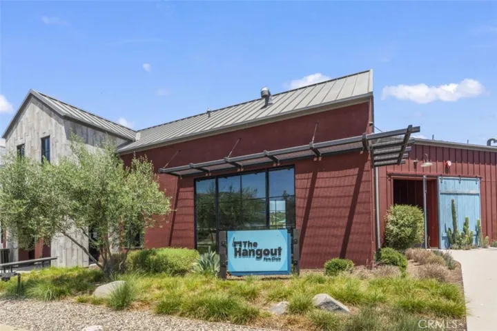 "THE HANGOUT" @ PARK CIRCLE FEATURING A POOL, FITNESS CENTER, EVENT CENTER AND  OUTDOOR LIVING ROOM IS JUST ONE OF THE THREE UNIQUE RECREATION CENTERS AT CIRCLE PARK, ALONG WITH "THE LOOKOUT" AND "THE BACK PORCH” FEATURING SPORTS COURTS,  ANOTHER POOL, PLAYGROUND AND DOG PARK.