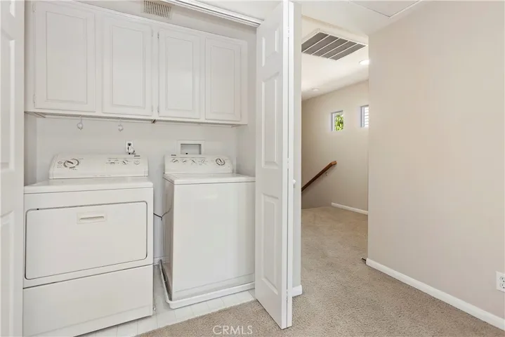 Laundry area upstairs.