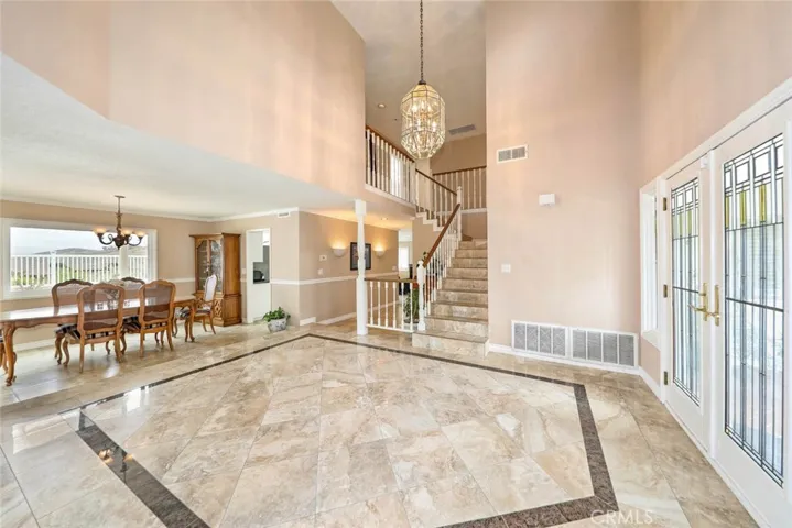 Gorgeous marble tile flooring throughout