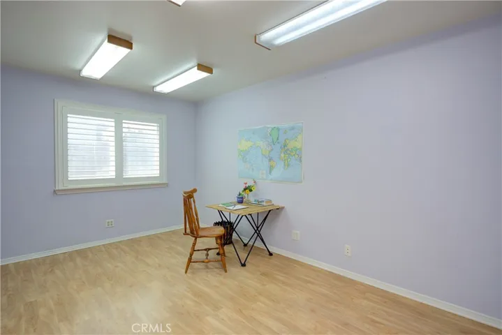 Bedroom 4 with additional lighting, laminate floors