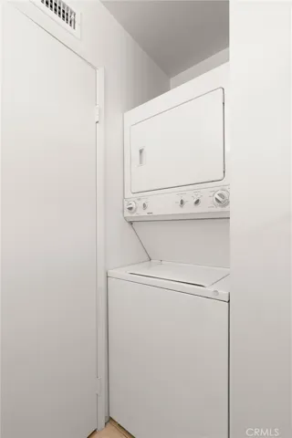 Washer/dryer behind the hall bath door.