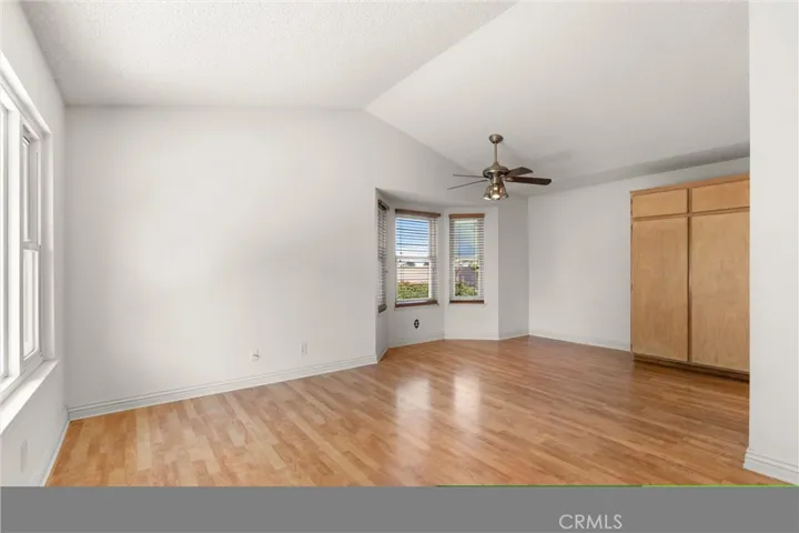 Living room with dining area by bay window