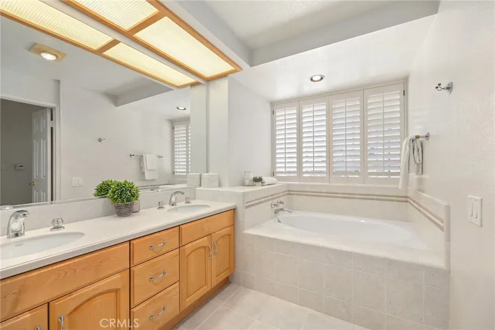 Primary Bathroom with soaking tub and vanity