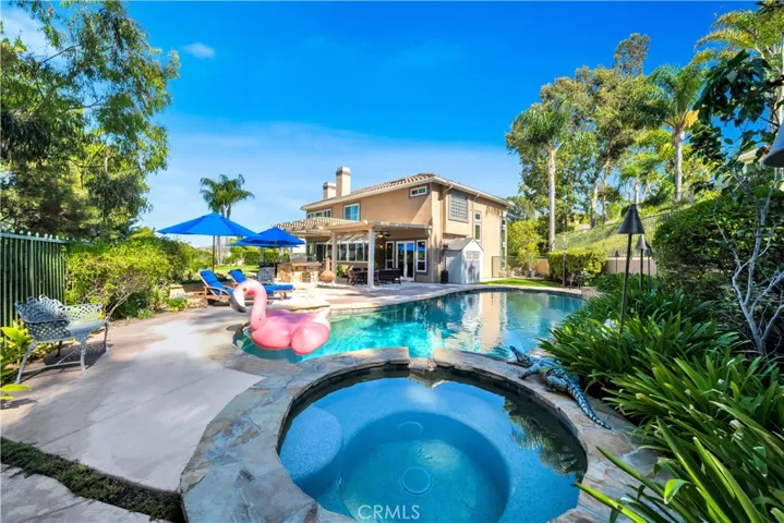 Heated Spa Cascades into Pool