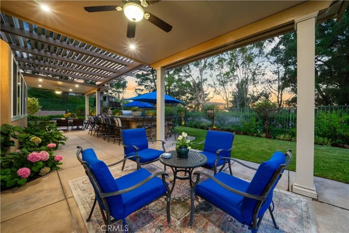 Large Covered Patio With Several Seating Areas