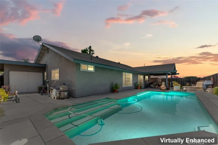 Backyard with drive through garage