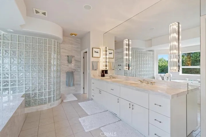 Dual vanities and walk in shower
