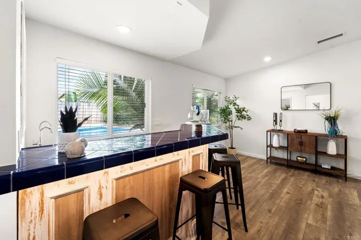 Pass through window allows you to grab a drink or snack from the bar without having the pool area!