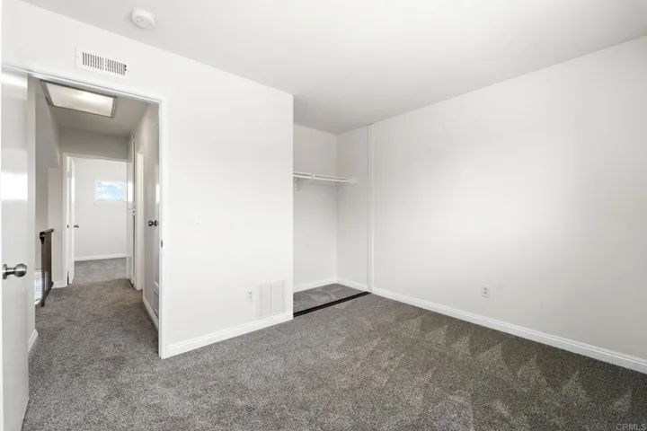 3rd bedroom up with new carpet & fresh paint.