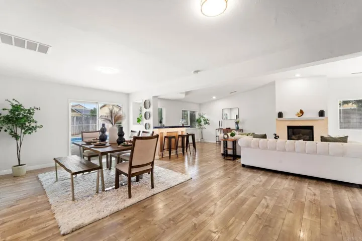 A great room with an open concept dining & family room is a versatile space ideal for entertaining.
