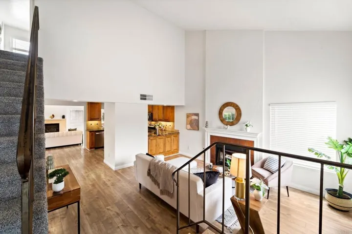 Despite the lofty height of the ceilings, the living room still manages to feel cozy and welcoming.