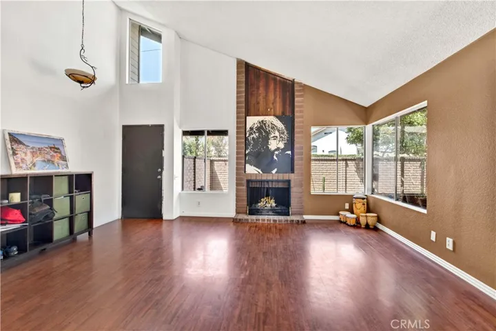 Soaring Ceiling and Fireplace in Living Room