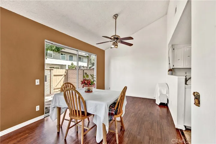 Dining Room is Open to Kitchen and has Slider to Wrap-Around Patio