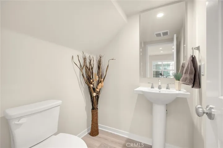 Downstairs guest powder room.
