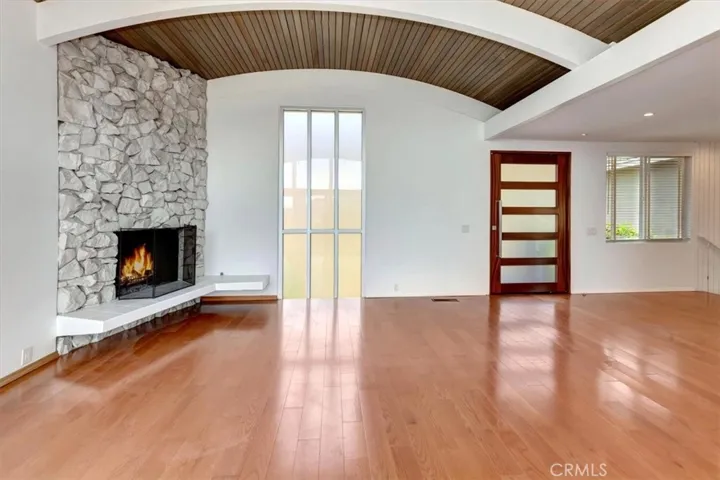 Family room with gas fireplace and vaulted ceilings