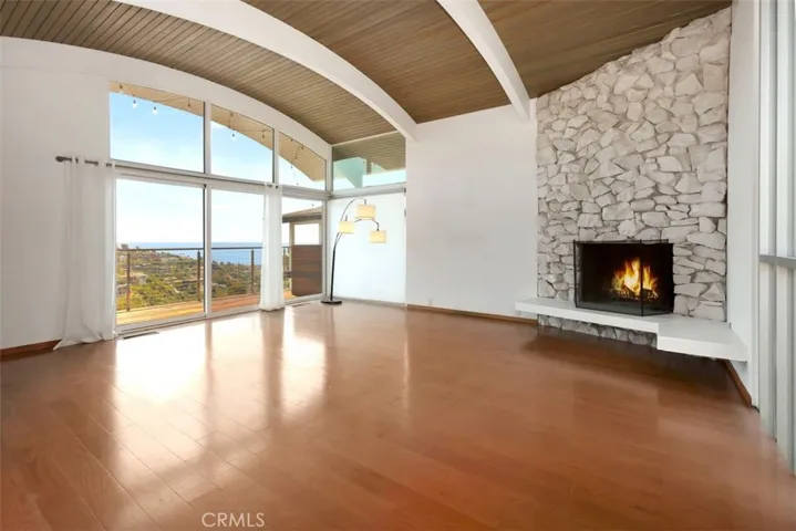 Ocean view family room with gas fireplace