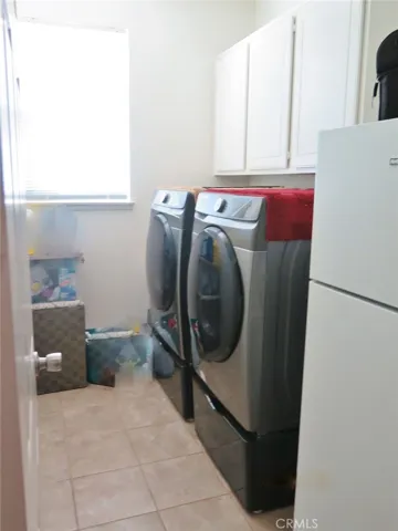Spacious Laundry Room with Desk nook next door