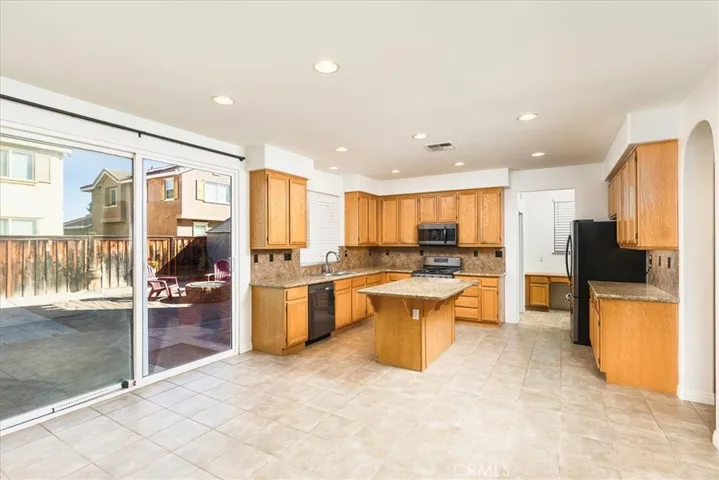Btween the family room and kitchen, room for breakfast table and chairs